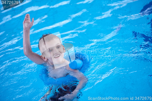 Image of child on swimming poo