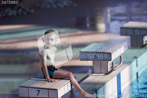 Image of child portrait on swimming pool