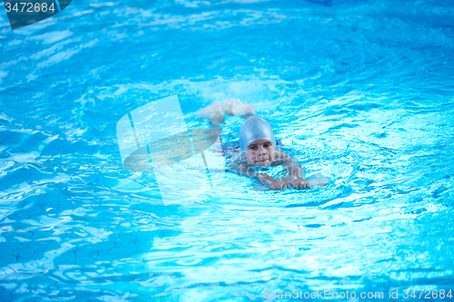 Image of child on swimming poo