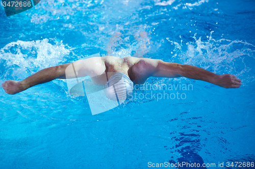 Image of swimmer excercise on indoor swimming poo