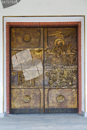 Image of abstract  church door    in italy  gold column  the milano  