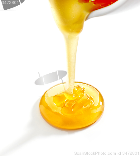 Image of pouring honey