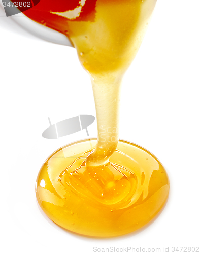 Image of pouring honey