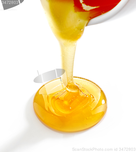 Image of pouring honey