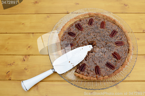 Image of Pie server in a sliced pecan pie