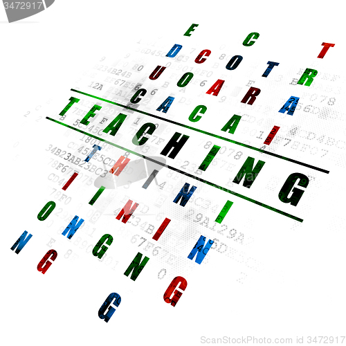Image of Education concept: word Teaching in solving Crossword Puzzle