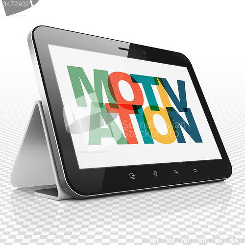 Image of Business concept: Tablet Computer with Motivation on  display