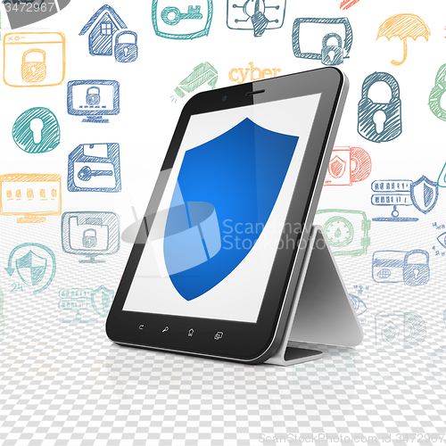 Image of Protection concept: Tablet Computer with Shield on display