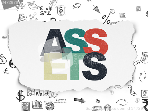 Image of Money concept: Assets on Torn Paper background