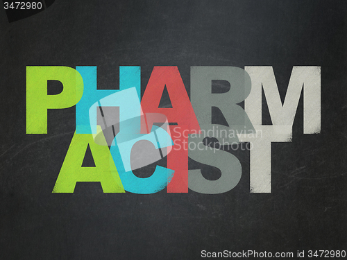 Image of Medicine concept: Pharmacist on School Board background
