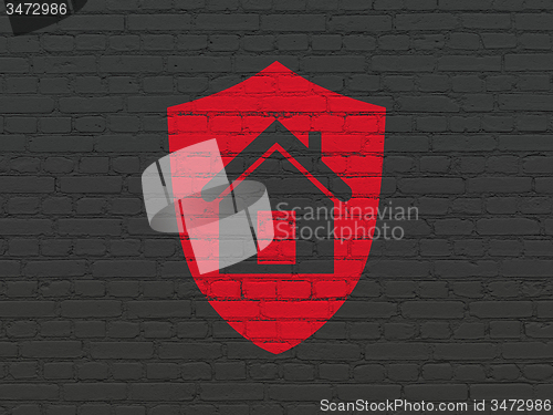 Image of Finance concept: Shield on wall background