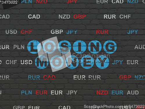 Image of Currency concept: Losing Money on wall background