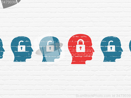 Image of Privacy concept: head with padlock icon on wall background