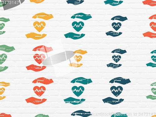 Image of Insurance concept: Health Insurance icons on wall background
