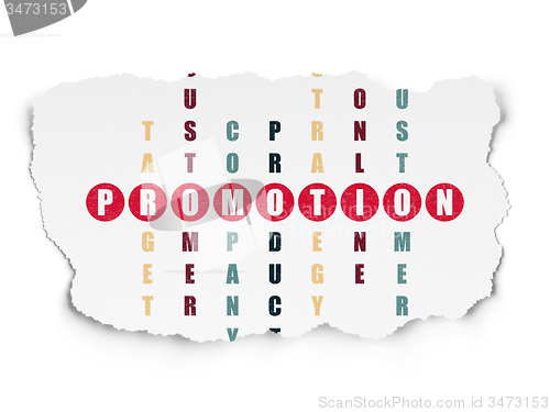 Image of Advertising concept: word Promotion in solving Crossword Puzzle