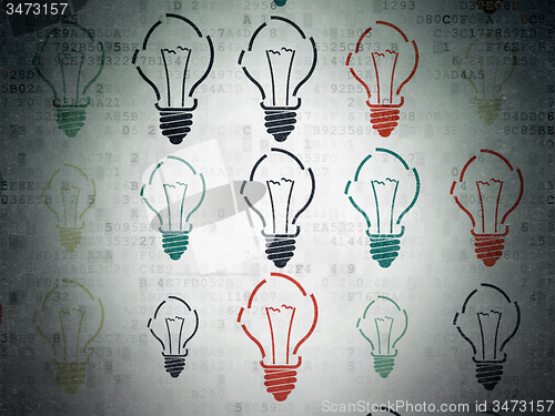 Image of Finance concept: Light Bulb icons on Digital Paper background
