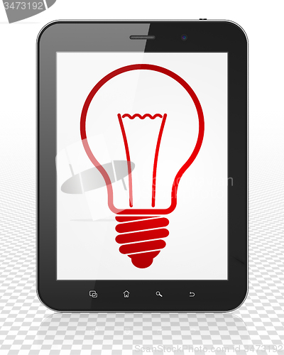 Image of Finance concept: Tablet Pc Computer with Light Bulb on display