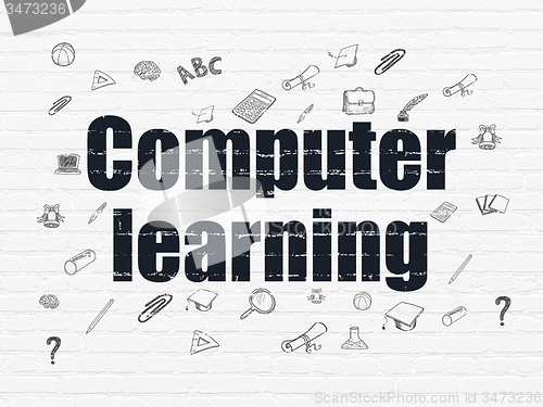 Image of Education concept: Computer Learning on wall background