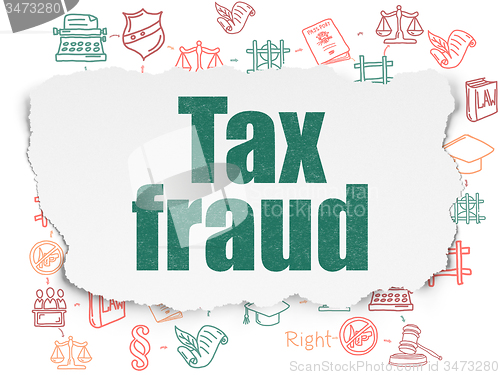 Image of Law concept: Tax Fraud on Torn Paper background
