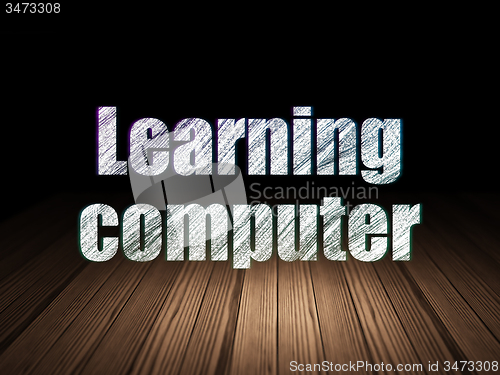 Image of Learning concept: Learning Computer in grunge dark room