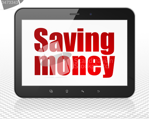 Image of Finance concept: Tablet Pc Computer with Saving Money on display