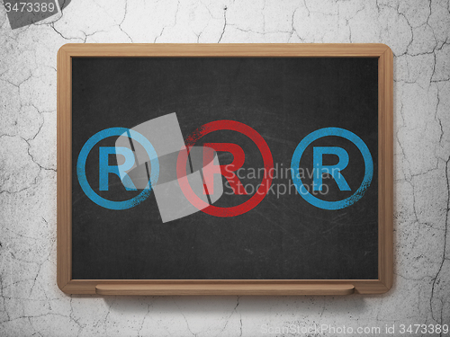 Image of Law concept: registered icon on School Board background