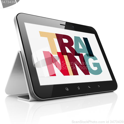Image of Learning concept: Tablet Computer with Training on  display