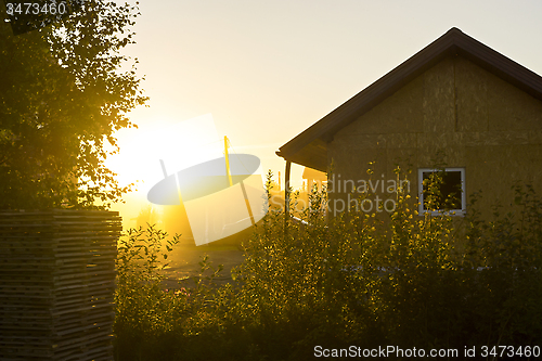 Image of Vivid sundown light in village