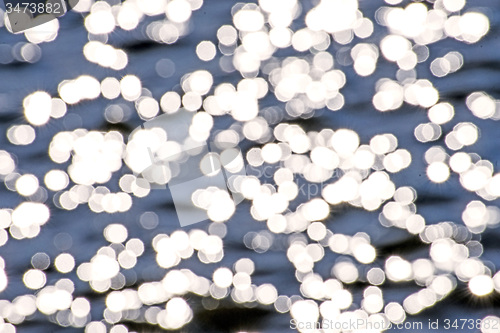 Image of Water with sun reflections