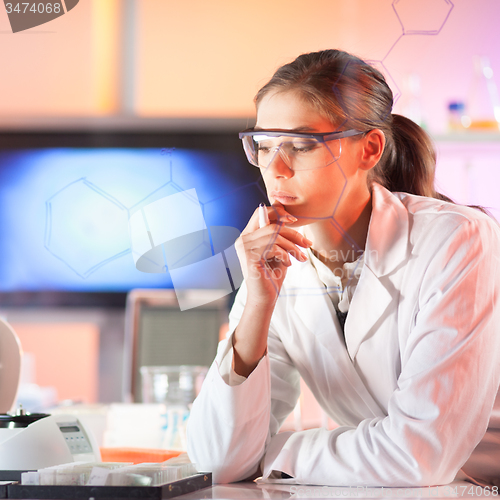 Image of Life science researcher working in laboratory.