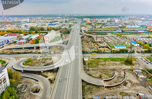 Image of Aerial view of highway interchange of modern urban city