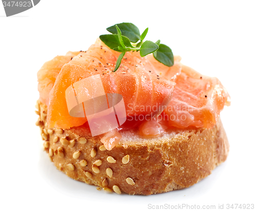 Image of bread with salmon fillet