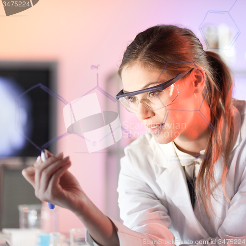 Image of Life science researcher working in laboratory.