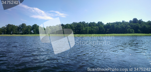 Image of  large lake with an island and reeds