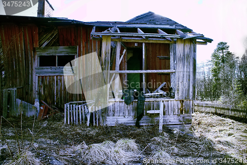 Image of destroyed house  porch and entrance ruins