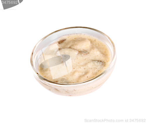 Image of mushrooms sauce in a small glass
