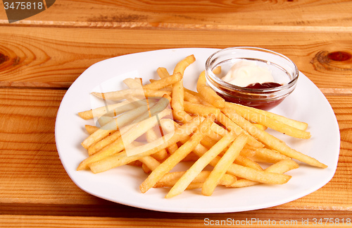 Image of French fries with ketchup