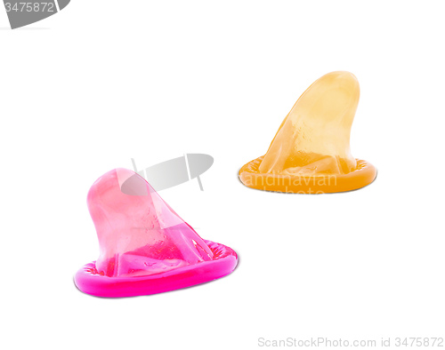 Image of pink and yellow condoms