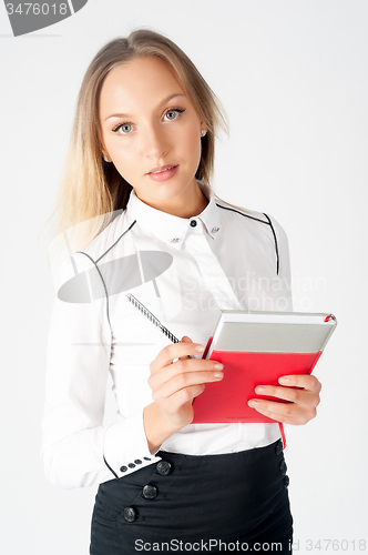 Image of Portrait of pretty business lady with organizer