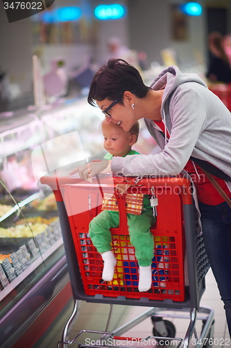 Image of mother with baby in shopping