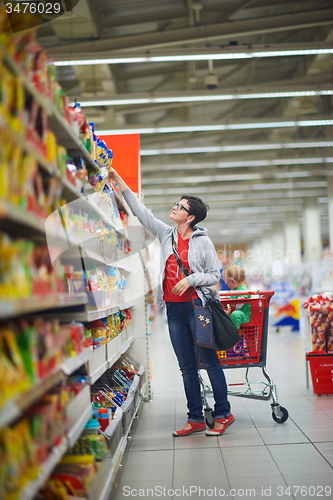 Image of mother with baby in shopping