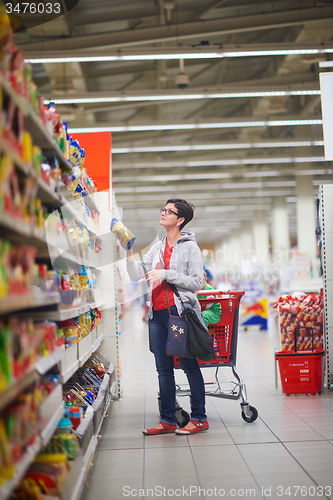 Image of mother with baby in shopping