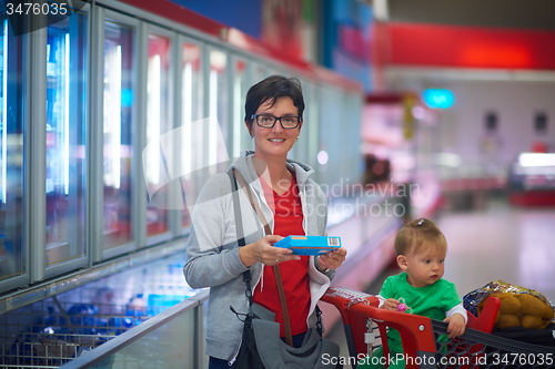 Image of mother with baby in shopping