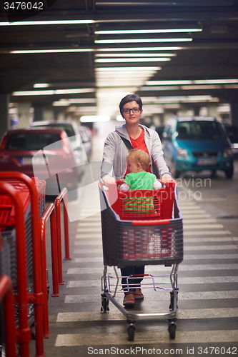 Image of mother with baby in shopping