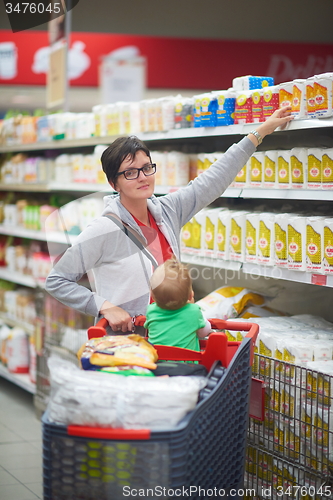 Image of mother with baby in shopping