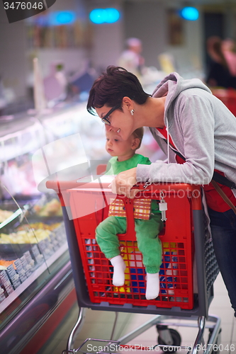 Image of mother with baby in shopping