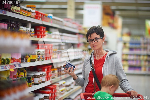 Image of mother with baby in shopping