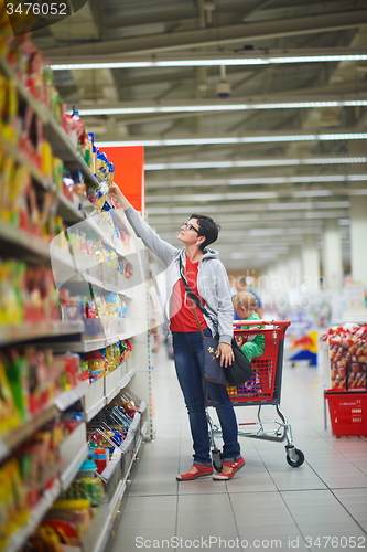 Image of mother with baby in shopping