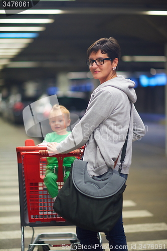 Image of mother with baby in shopping