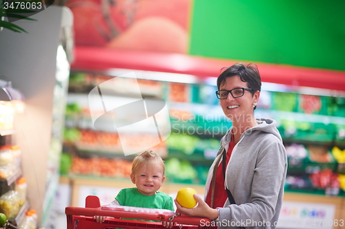 Image of mother with baby in shopping